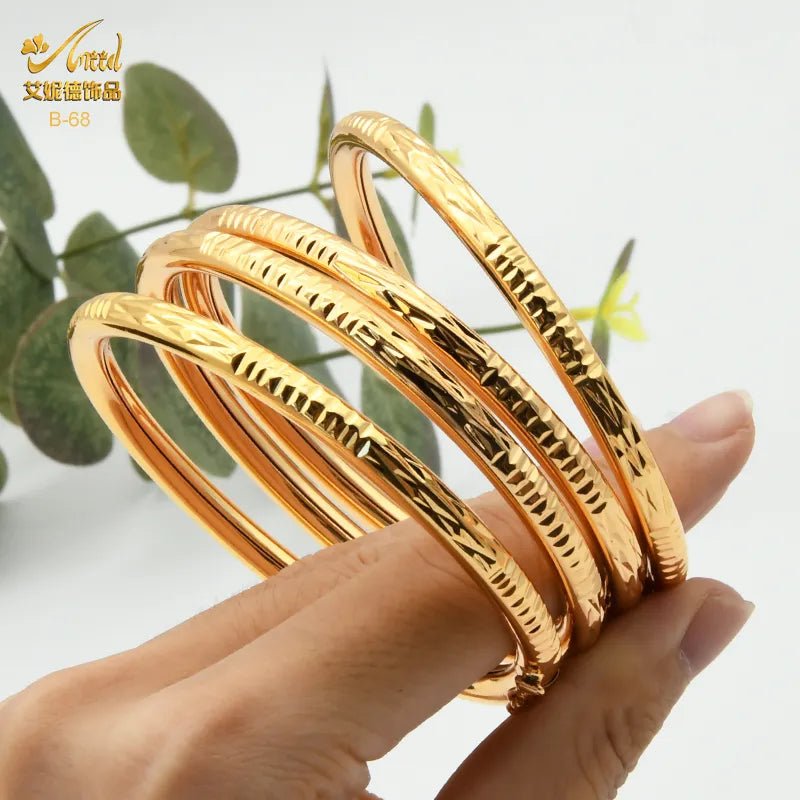 Luxurious African Jewelry: Gold-Toned Copper Bangle Bracelet for Women - Flexi Africa - Flexi Africa offers Free Delivery Worldwide - Vibrant African traditional clothing showcasing bold prints and intricate designs